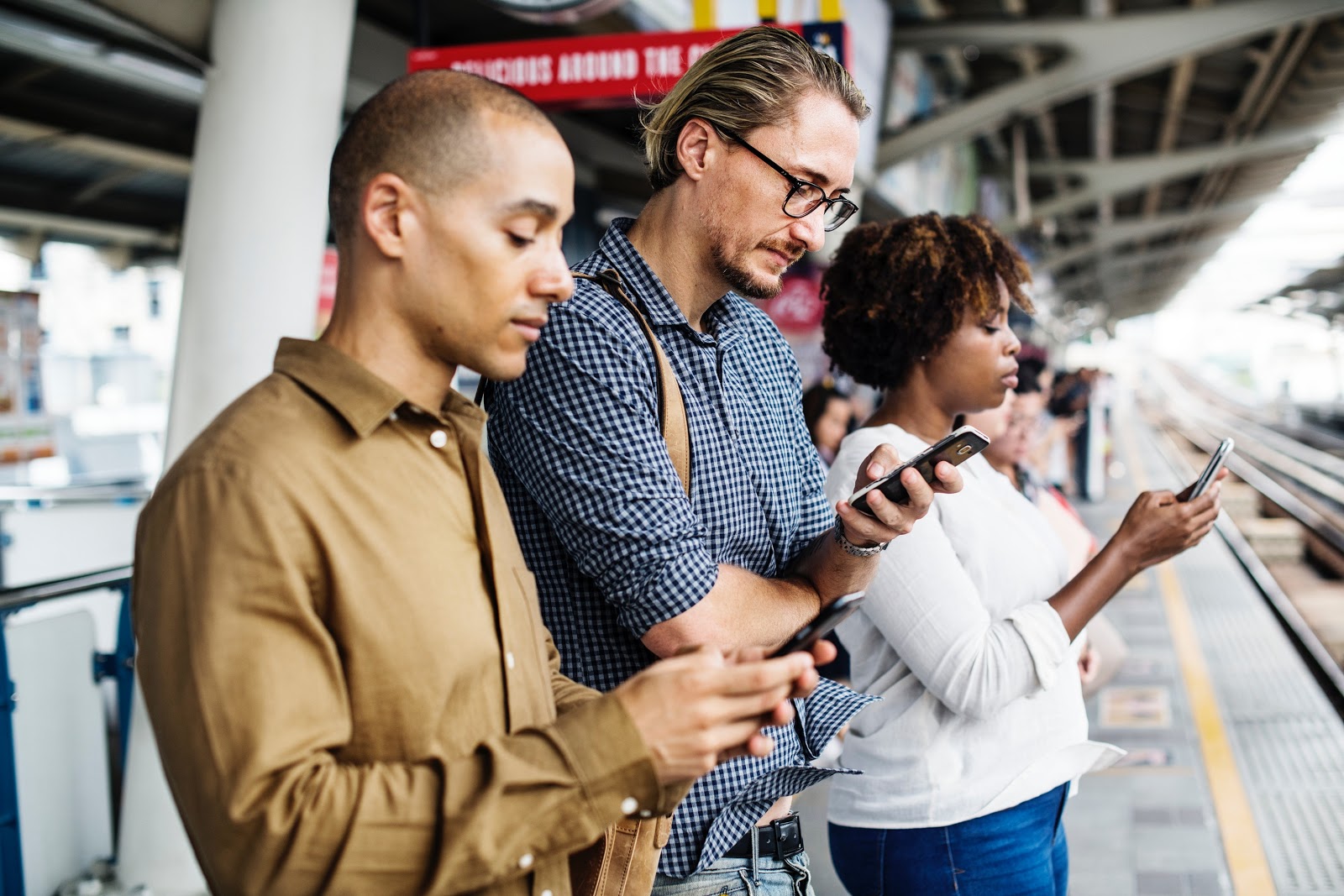 People reading on smartphones